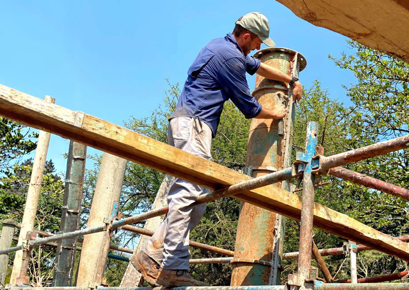 Hands-on construction work on scaffolding