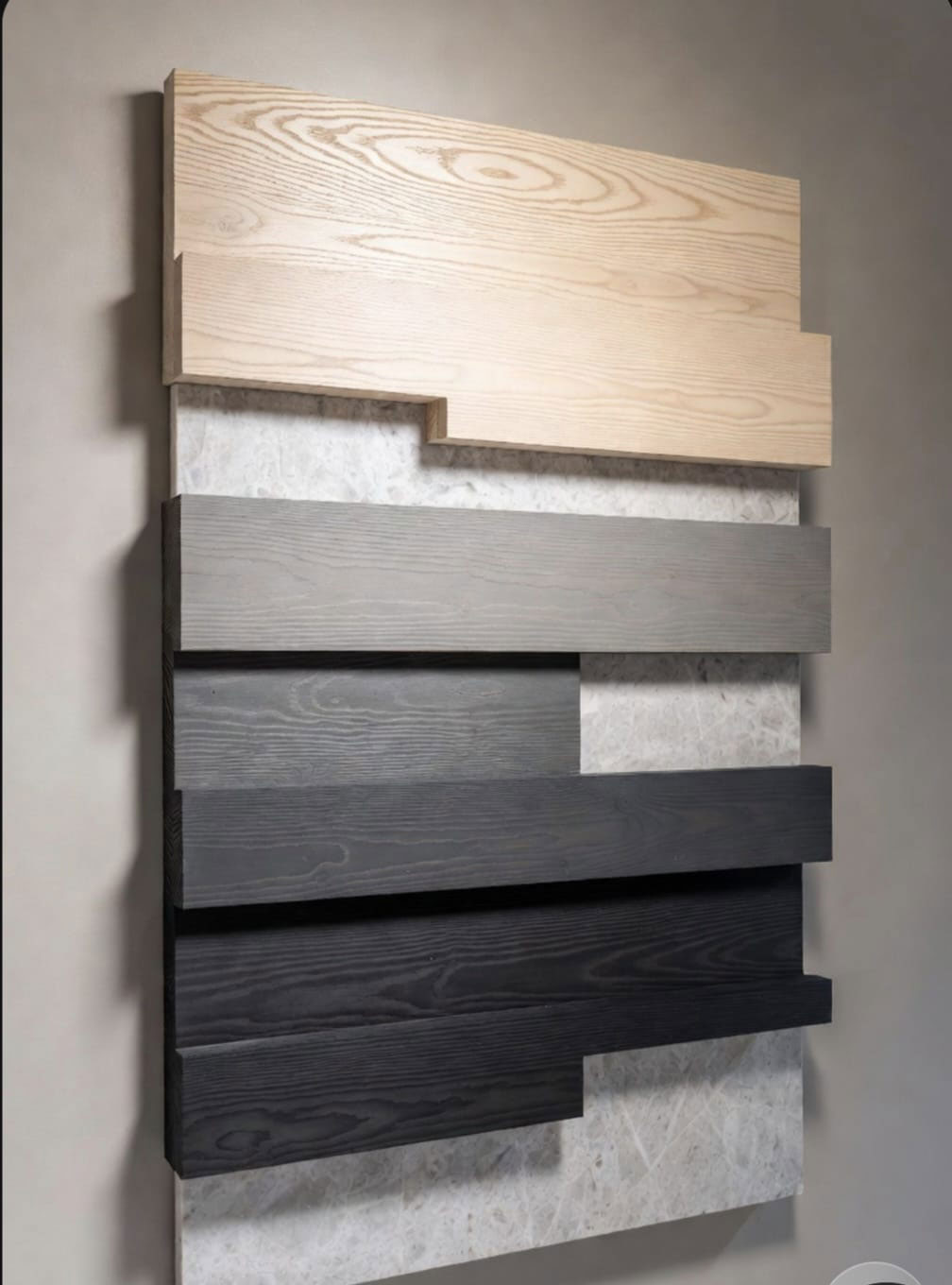 Layered wood and stone interior wall feature